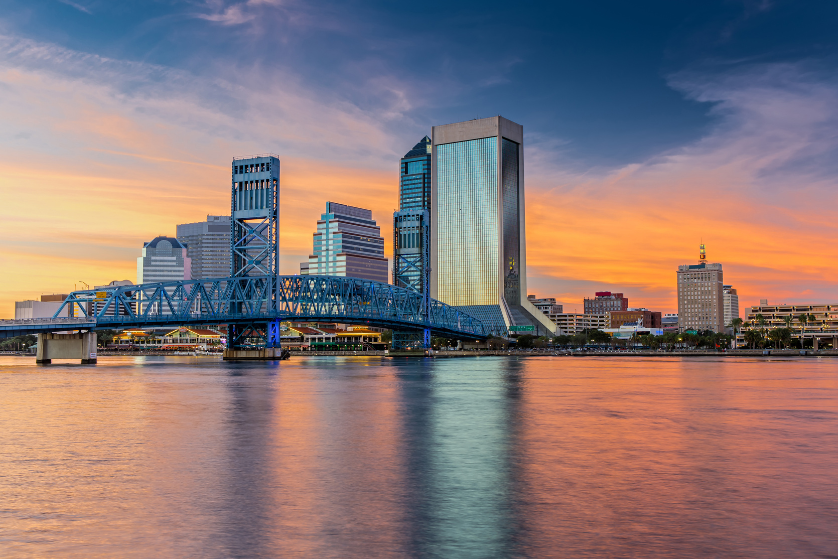 Skyline of Jacksonville, FL and Main Street Bridge at Sunset