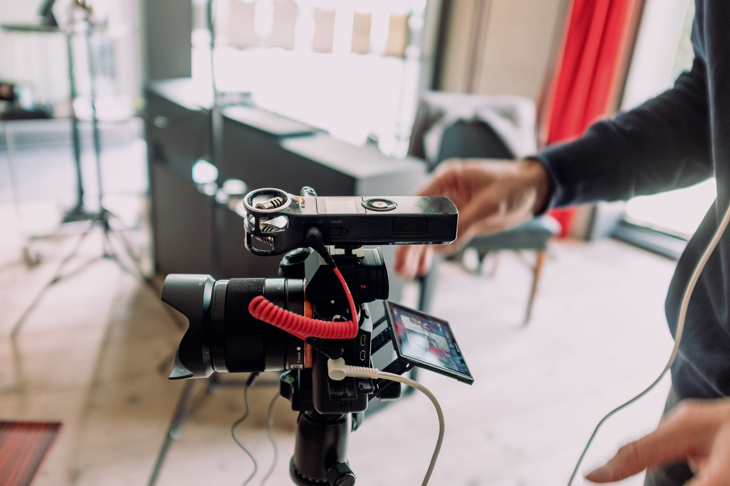 Videographer Sets up a Camera